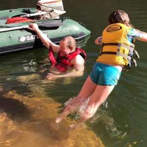 Media 'Swimming in Forgotton Canyon.  Weather was cool for Lake Powell.  Highs in the 70?s.  Still much better than the snow when leaving & arriving from Cokeville, WY.' in album 'Camped just under the front of the pinnacle.  The pinnacle is the front  of the Island  where Explorer Canyon joins the Escalante.'