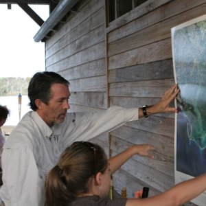 Host John puts up the Aerial photo of the Apalachicola Basin