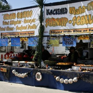 Seafood Festival booths in Battery Park. Apalachicola has several outstanding seafood eateries.