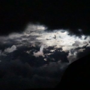 Storm clouds by moonlight