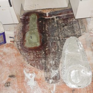 Here I've removed the original fiberglass patch and sanded down to the epoxy layers I laid from the bottom. The area has been painted with epoxy resin in preparation for new layers of fiberglass to go on top. Also note at this point I pulled the entire floor up because I found unacceptably high moisture readings everywhere. The remainder of the balsa core appeared sound and didn't feel wet. After just 24 hours the moisture meter read 0% moisture everywhere.