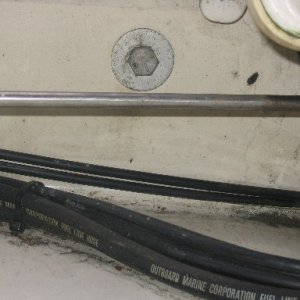 Closeup of the transom near motor brackets.