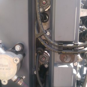 Rear plastic cover removed showing 2 of 3 internal anodes. 3rd is lower right of engine (no picture)