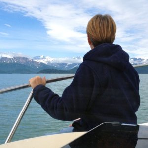 Mary watching for whales and sea otters