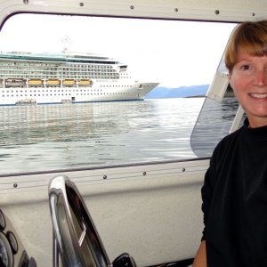 Mary driving by a cruise ship in Hoonah that her friend was on.