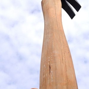Casey and the 20 foot hammer at the Haines Hammer Museum.