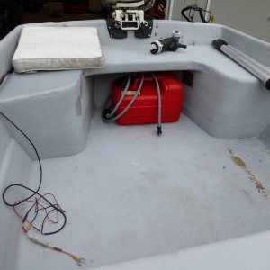 Needs some touch-up interior paint. You can see a couple of test patches I did on the starboard side rear seat with Interlux Interdeck.  Looks pretty good, Think I'll do the whole thing. Wires for fish finder installed by previous owner. Long shaft transom!