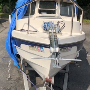 Lone Star Marine Anchor Winch with 13 lbs anchor and 20' of chain holds the boat nicely.