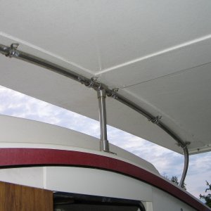 Forward roof arch with center vertical support.  SS straps are Harken brand strap eyes.  Tubing is 7/8 SS.