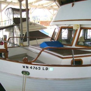 Foredeck with teak deck and anchor windlass.