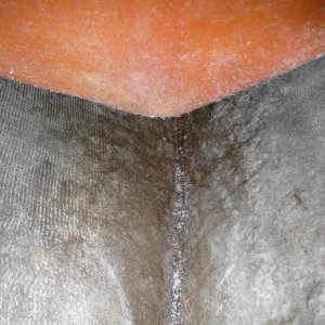 Looking straight down at the inside of the stem and a bit aft. The orange is the backside of the forward "V" storage locker bulkhead. There  is about a 2" clearance under the "V" storage locker.