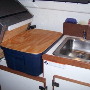Media 'custom made cutting board fits on top of tote for more counter space.' in album 'Susan Marie Ready for cruising.'