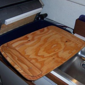 Under side of cutting board for tote.