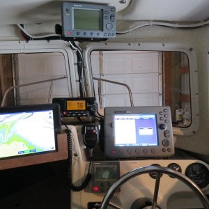 Ipad mount in viewing position for the captain with navionics chart plotter.