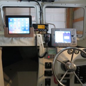 Ipad mount folded up out of the way. can also be tilted to port for passenger viewing