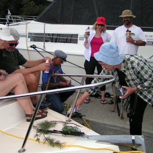 (Pat Anderson) Ruth Pours Elixir on the Bow of Anita Marie