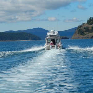 C-Cakes, with Patti out in back, ahead of See-Saw motoring through the San Juans