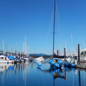 The boat docks at Friday Harbor Marina, with a gorgeous blue trimaran