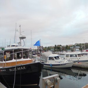 16' See-Saw nestled between a tug and a 22' C-Dory