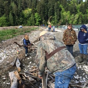Media 'windy opener maddie collecting wood for the beach fire that was needed.' in album 'cleaning table we made'