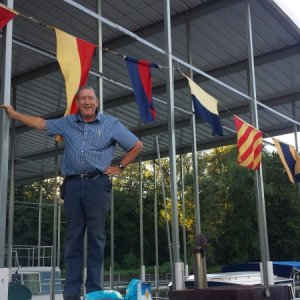 Mike displaying his father's flags.