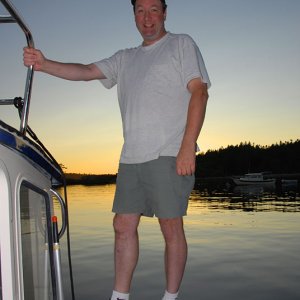 My friend Jay walking the plank at sunset