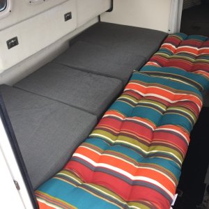 I have a full size, 3" memory foam mattress topper to place on top of the cushions