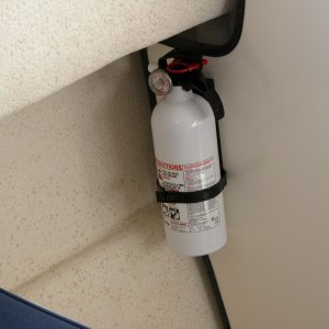 Third (3rd) fire extinguisher added inside cabin, port side.