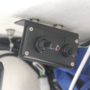 GoLight 2025 Control Panel mounted on a bracket attached to the marine antenna mounting base hardware.