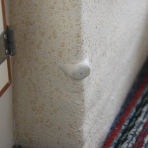 Media 'Bumper set with "5200" to protect cabinet door. 
As a side note: A fitted grey indoor/outdoor carpet is laid over fitted 'dry deck' panels and a colored(viewed) runner is placed on top. Each is very easy to remove,clean or replace.' in album 'Toys are all in: Raymarine 4KW radar w/ C80 display, Garmin 2006C w/fish finder , ST6001 Autopilot, NAVMAN 3100 Fuel Flow management system, ICOM M502 VHF and Standard Signaler/Hailer. Love those toys; especially the radar chart overlay & fuel management system.'