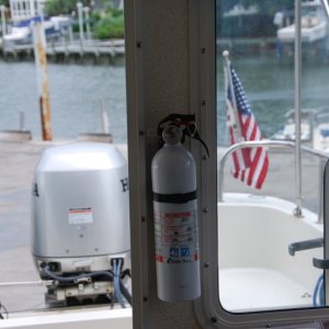 Media 'First fire extinguisher - inside cabin door, port side.' in album 'Toys are all in: Raymarine 4KW radar w/ C80 display, Garmin 2006C w/fish finder , ST6001 Autopilot, NAVMAN 3100 Fuel Flow management system, ICOM M502 VHF and Standard Signaler/Hailer. Love those toys; especially the radar chart overlay & fuel management system.'