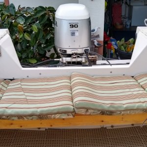 Rear bench seat with cushions