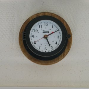 Ship clock mounted above door