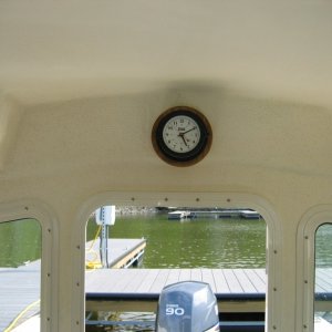 Ship clock mounted above door