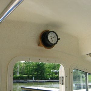 Ship clock mounted above door