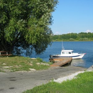 Goofy floating pier at Manistee Lake. Starboard is 6 feet deep, port 28 feet deep.