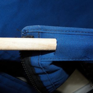 Media 'I cut a slit on the inside of the hem on the bottom to fit a piece of dowel.' in album 'This is how the original panel rolled up and hung.  It was difficult to get a tight roll.'