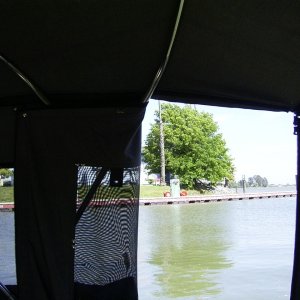 The side panel folds back and snaps to keep it open.