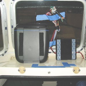 1/2"X6"X6" acrylic(Tap Plastics) secured with velcro.