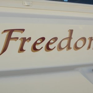 Name designed using Boat US graphics website.  Excellent design website, fast service, and easy to apply. And it looks great!