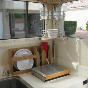 Galley with corner shower caddy, plate holder and paper towel holder.    Note: we?ve now been using this stainless caddy for ~7 years.  It still looks new with no signs of rust.  It?s been a great addition in the galley.