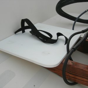Platform set on, with the brass screws (tops removed)used to hold the platform in place.  All 3 pieces are completely separate which allows for easy setup, removal, and storage.  Nothing is attached to or screwed into the boat.