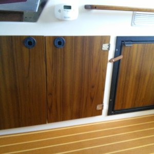 Cabinet doors and refrigerator panel.   Simply covered the originals and you cannot tell. Yea!