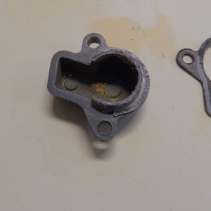 Media 'The thermostat and the cover had some build up.  Good thing I was careful removing the gasket, as the new thermostat did not come with a new gasket.' in album 'The thermostat and the cover had some build up.  Good thing I was careful removing the gasket, as the new thermostat did not come with a new gasket.'