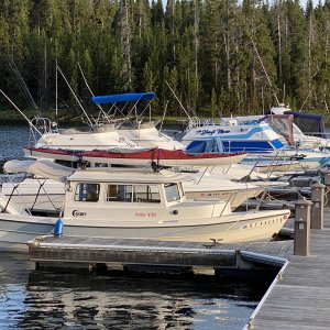 Pure Vida at Bridge Bay with its single 50 hp Honda following stops at Lakes Powell, Flaming Gorge & Jackson Lake.  The Easy does it crew have been getting around