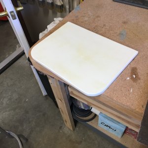 The table was so nice with the laminate, I decided to laminate the seats as well, that also hides the big hole in the port side seat that used to be used to open the hatch when it was in the cabin.