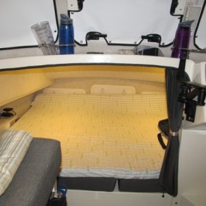66"x 80" 2.5" closed cell foam topper and washable cover almost perfect fit.