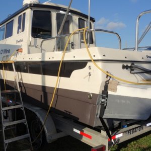 Media 'AFter bottom job for $318...sponsons in Pettit Hydrocoat (1 gal, two ocats) 1 can Primocon then  cans Pettit Alumaspray 2, $6 each on the gray market' in album 'berth with topper from amazon.com.  Marinebeam 18-LED lights.  Cabin 9 white, 3 red LED provide what E calls "that New Amsterdam Bordello effect" for when you want that.'