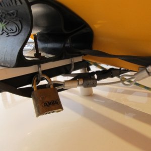 front strap to keep it from sliding rearward and also the lock/cable we keep on it while at the marina.
