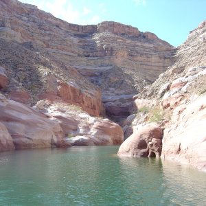 narrow canyon with green water
